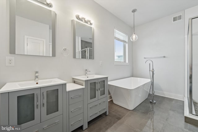 bathroom featuring independent shower and bath and vanity