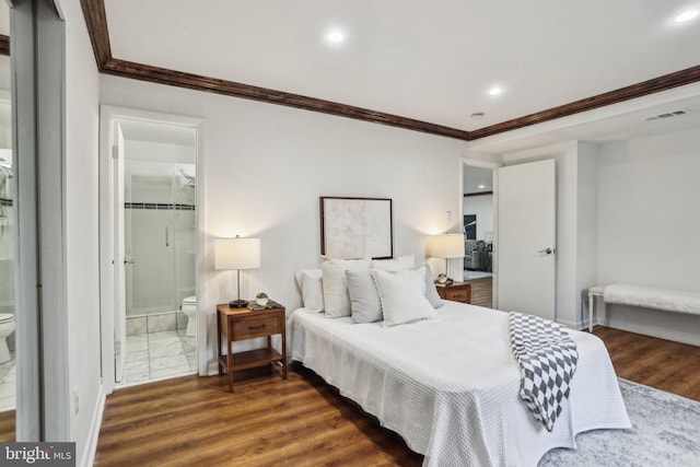 bedroom featuring dark wood-type flooring, visible vents, ornamental molding, and baseboards