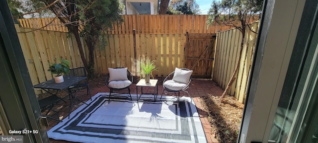 view of patio featuring a fenced backyard