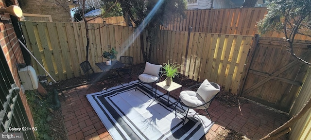 view of patio with a fenced backyard