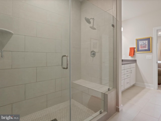 bathroom with vanity and an enclosed shower