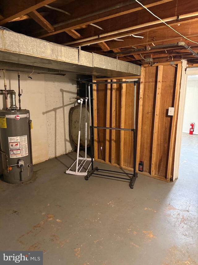 unfinished basement with water heater