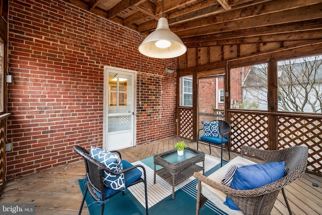 sunroom / solarium with wooden ceiling and beamed ceiling