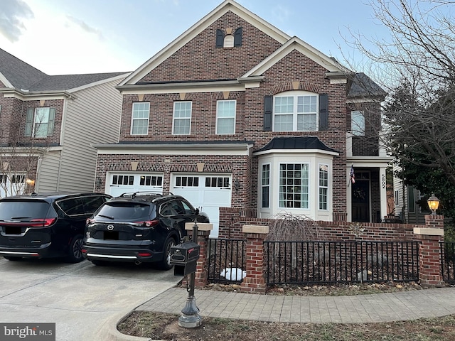 view of front of house with driveway, an attached garage, and brick siding