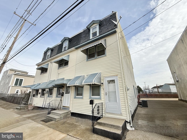 view of front of house with central AC unit