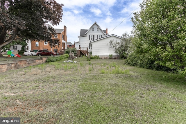 view of yard featuring a wooden deck