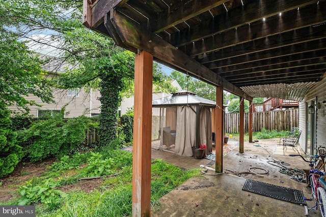 2202 228th St, Pasadena, MD 21122 - fenced backyard with a gazebo and a patio