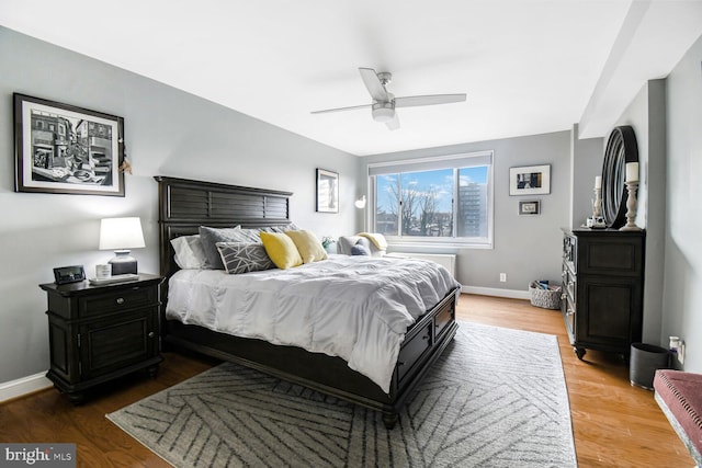 bedroom featuring ceiling fan and wood-type flooring