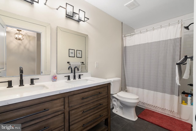 full bathroom with tile patterned floors, toilet, vanity, and shower / bathtub combination with curtain