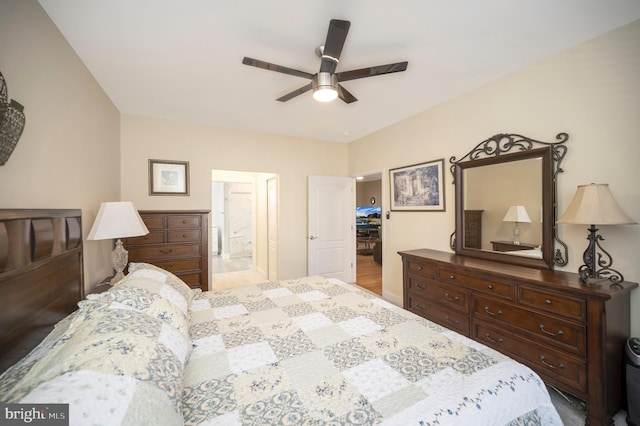 bedroom with ceiling fan and ensuite bath