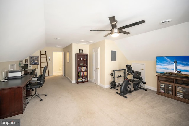 carpeted home office featuring baseboards, electric panel, visible vents, and vaulted ceiling