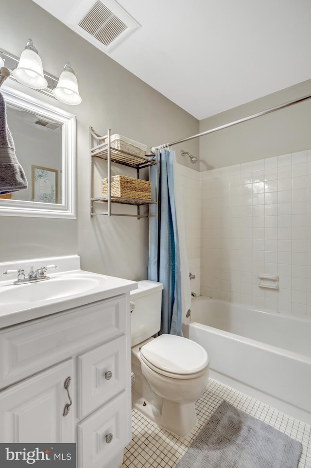 full bath with toilet, vanity, visible vents, tile patterned floors, and shower / bathtub combination with curtain