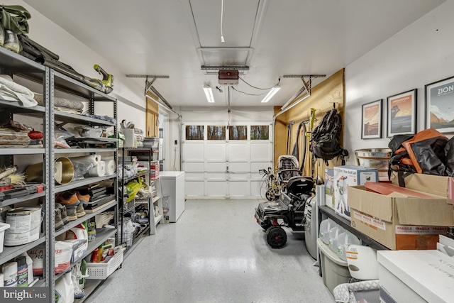 garage featuring a garage door opener