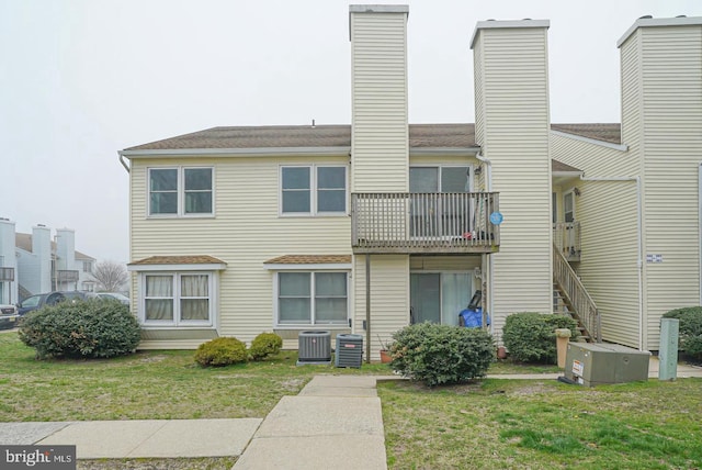 504 Skyline Condos, Pleasantville, NJ 08232 - exterior space with cooling unit and a lawn