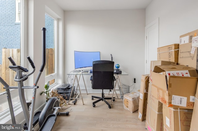 office space with light hardwood / wood-style floors