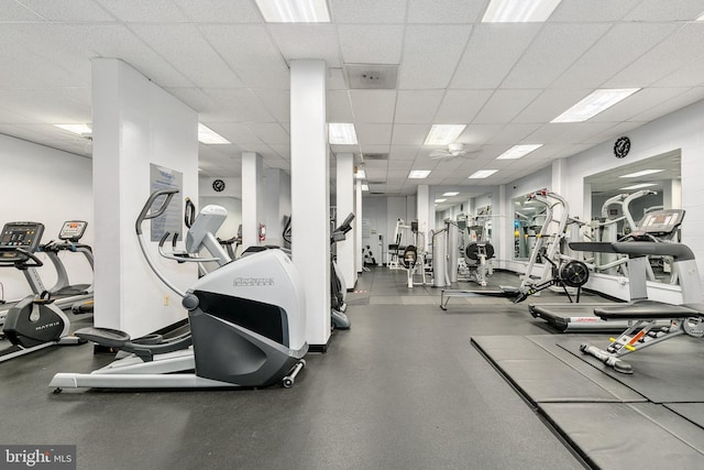 workout area with a drop ceiling