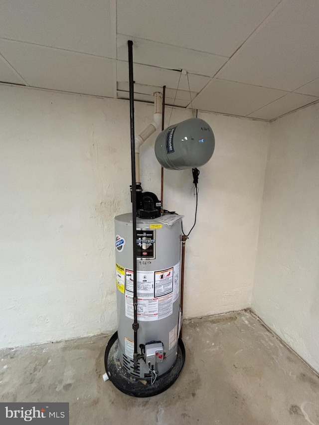 utility room featuring gas water heater