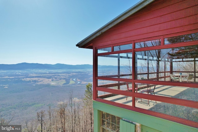 view of dock featuring a mountain view