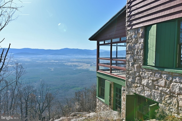 exterior space featuring a mountain view