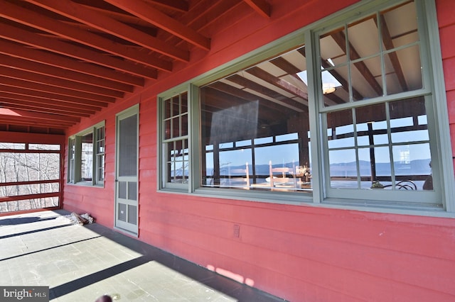 exterior space featuring beamed ceiling