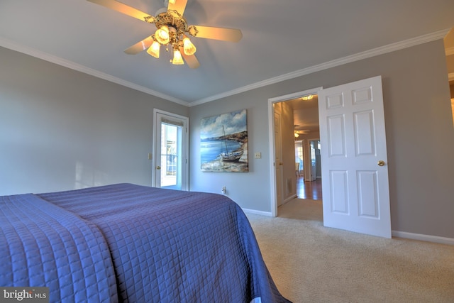 bedroom featuring carpet flooring, crown molding, baseboards, and ceiling fan