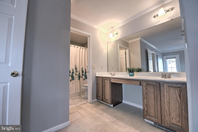 full bath with ornamental molding, a sink, toilet, and double vanity