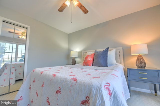 bedroom featuring baseboards, a ceiling fan, and light colored carpet