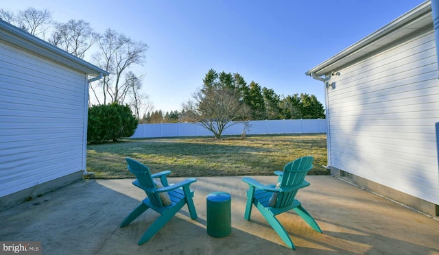 view of patio featuring fence