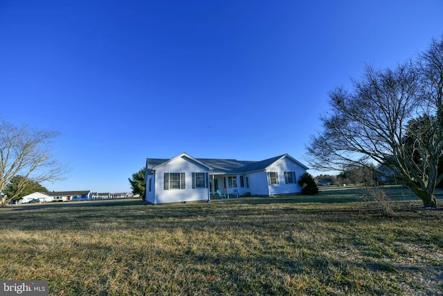 view of front of property with a front yard