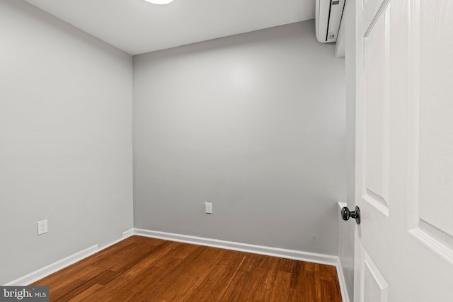 unfurnished room featuring wood-type flooring