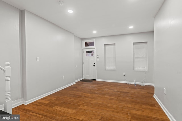 entrance foyer featuring hardwood / wood-style flooring