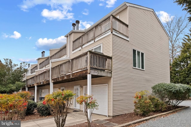 view of building exterior featuring an attached garage