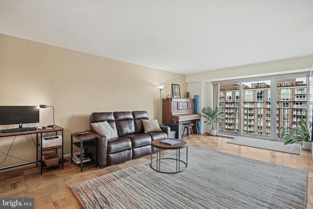 living room featuring light parquet flooring