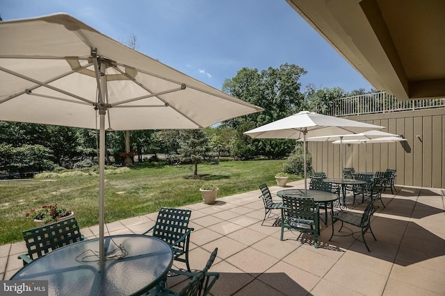 view of patio with outdoor dining area