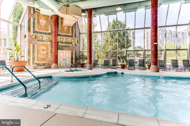 community pool featuring a patio area