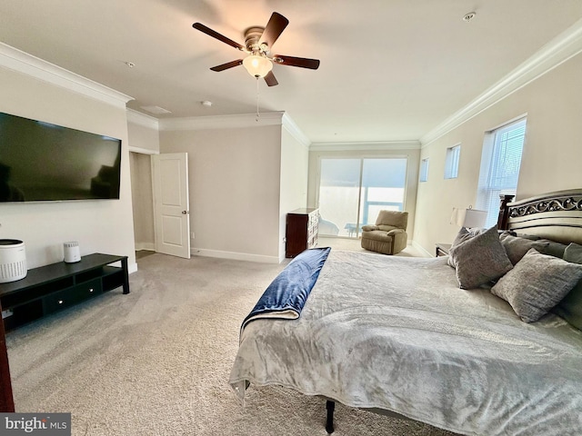 bedroom featuring ornamental molding, light colored carpet, and ceiling fan