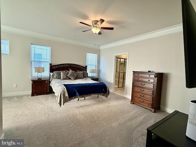 bedroom with crown molding, connected bathroom, light colored carpet, and ceiling fan