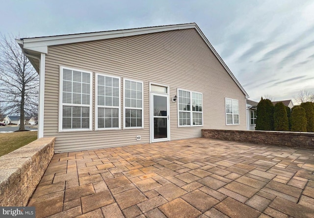 back of house with a patio area