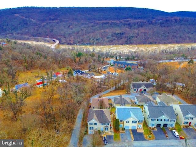 birds eye view of property with a residential view