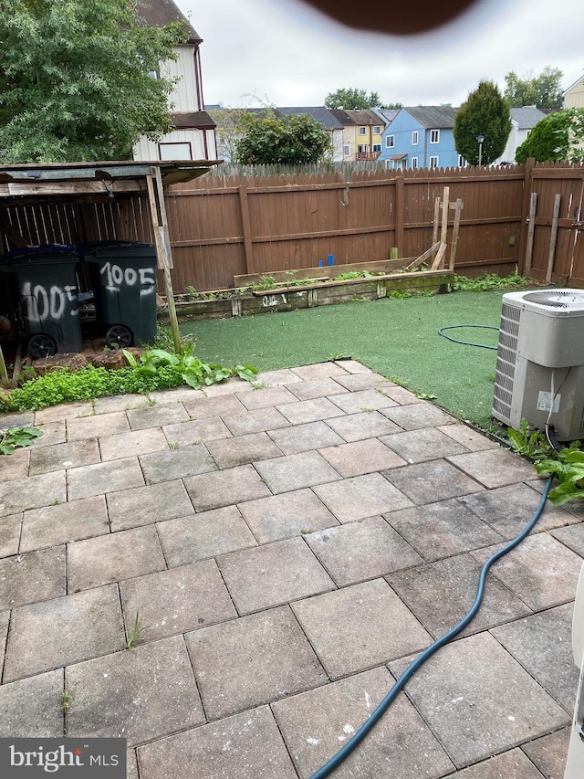 view of patio featuring cooling unit