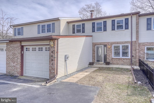 view of property with a garage