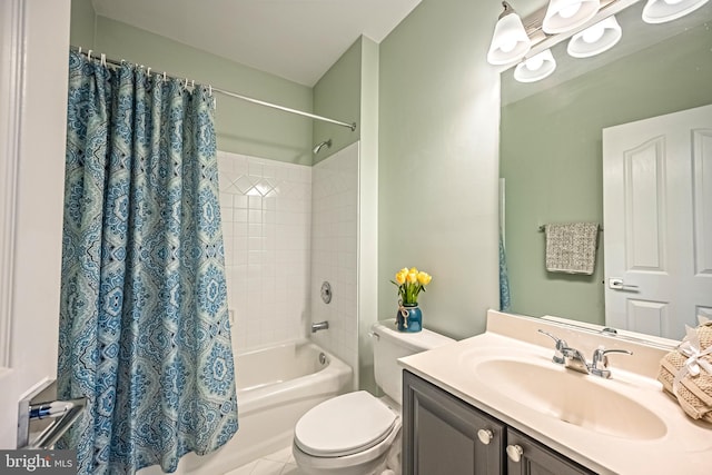 bathroom with toilet, shower / bath combo, and vanity