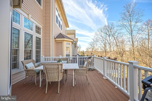 deck featuring outdoor dining space