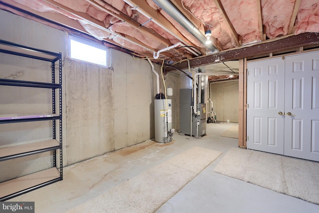 basement with heating unit and water heater