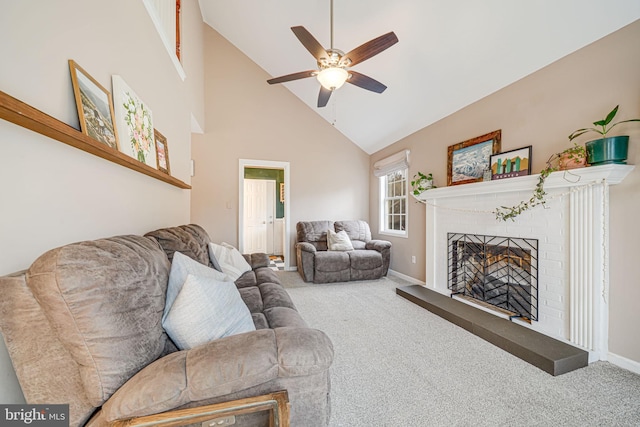 carpeted living area featuring baseboards, a fireplace, high vaulted ceiling, and a ceiling fan