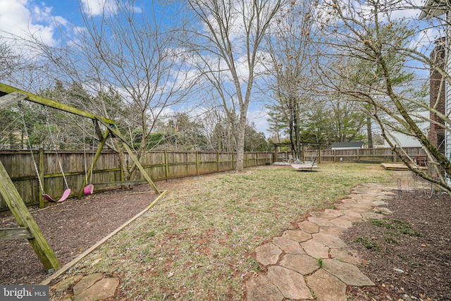 view of yard featuring a fenced backyard