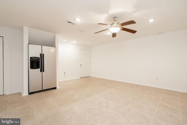 empty room with baseboards, visible vents, ceiling fan, and recessed lighting