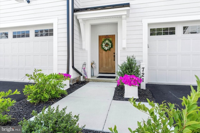 property entrance featuring a garage