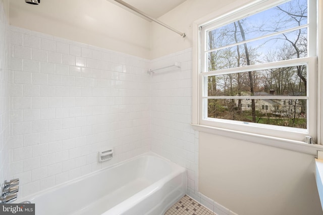 full bathroom featuring tile patterned floors and shower / bath combination