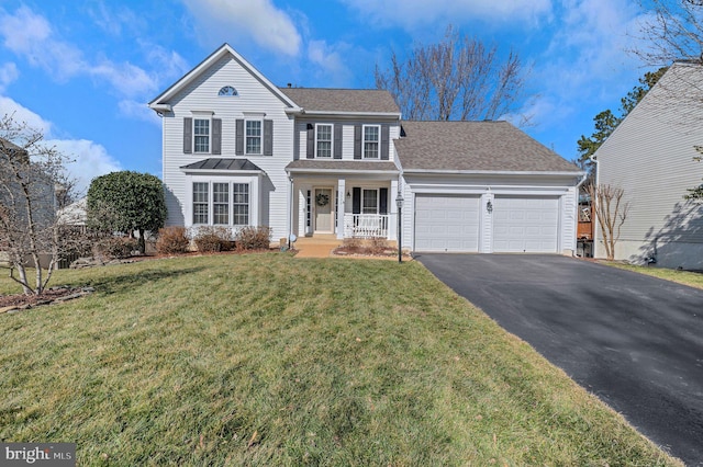 view of front facade featuring a porch, a garage, a shingled roof, driveway, and a front lawn